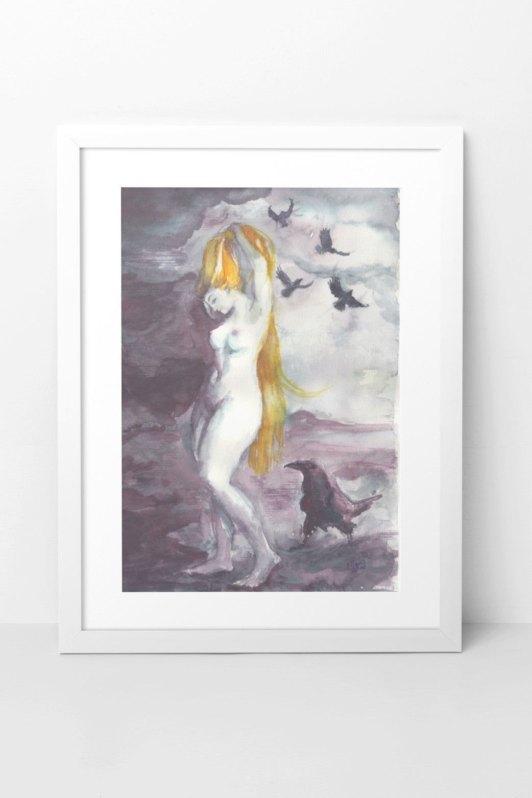 Watercolor painting of a naked fair-skinned woman brushing her long golden hair beside a raven that has landed and is looking at her. Four other ravens are flying above her. The colors are dark and soft, primarily black, gray, and purple, creating a mysterious and ethereal atmosphere. The A4-sized artwork is depicted in a white mock-up frame against a white wall background.
