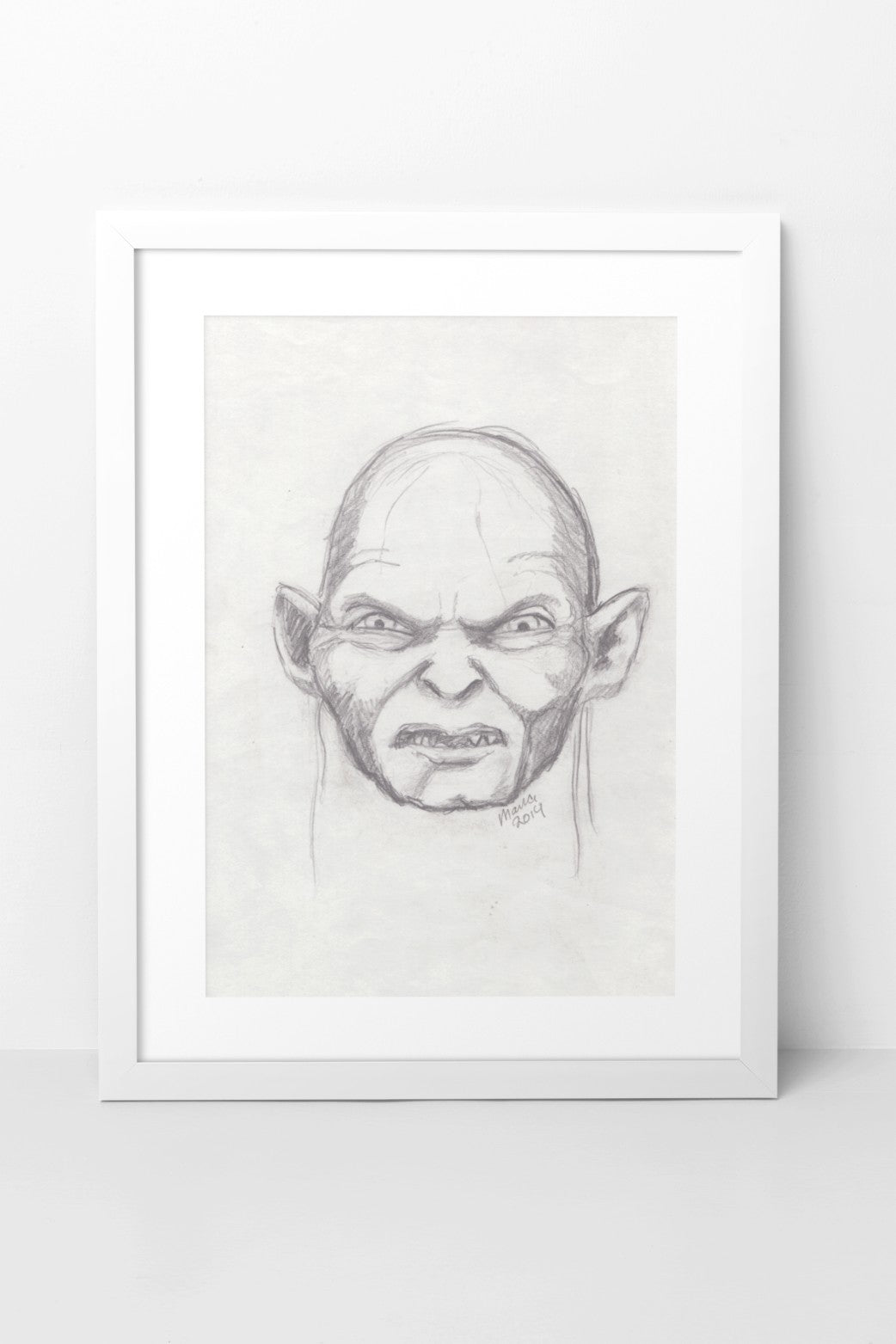 Pencil drawing of Gollum from The Lord of the Rings, depicted in grayscale. The artwork features a close-up of his angry face, capturing his intense and menacing expression. The A4-sized artwork is displayed in a white mock-up frame against a neutral background, emphasizing its dramatic detail and grayscale tones.