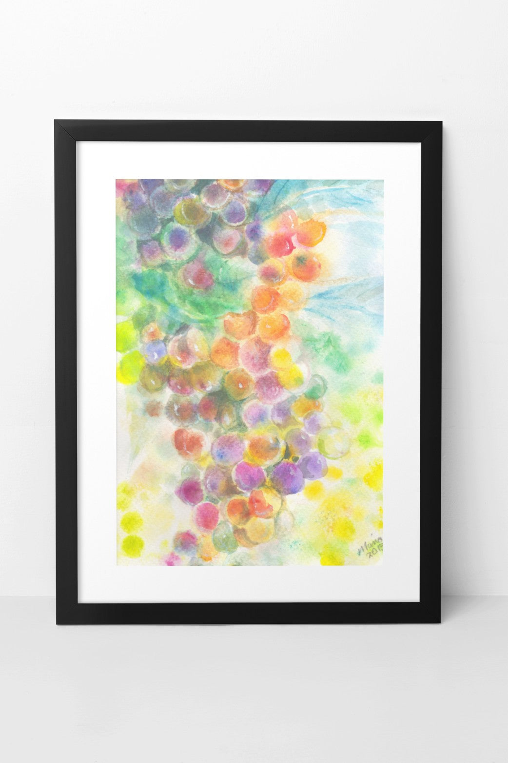 Colorful artwork depicting fresh, plump sweet grapes still on the vine. The vibrant colors range from yellow tones, orange, pink, red, green, blue, to purple, creating a lively and appetizing scene. The A5-sized artwork is displayed in a black mock-up frame against a neutral background, highlighting its vibrant colors and detailed depiction of the grapes.