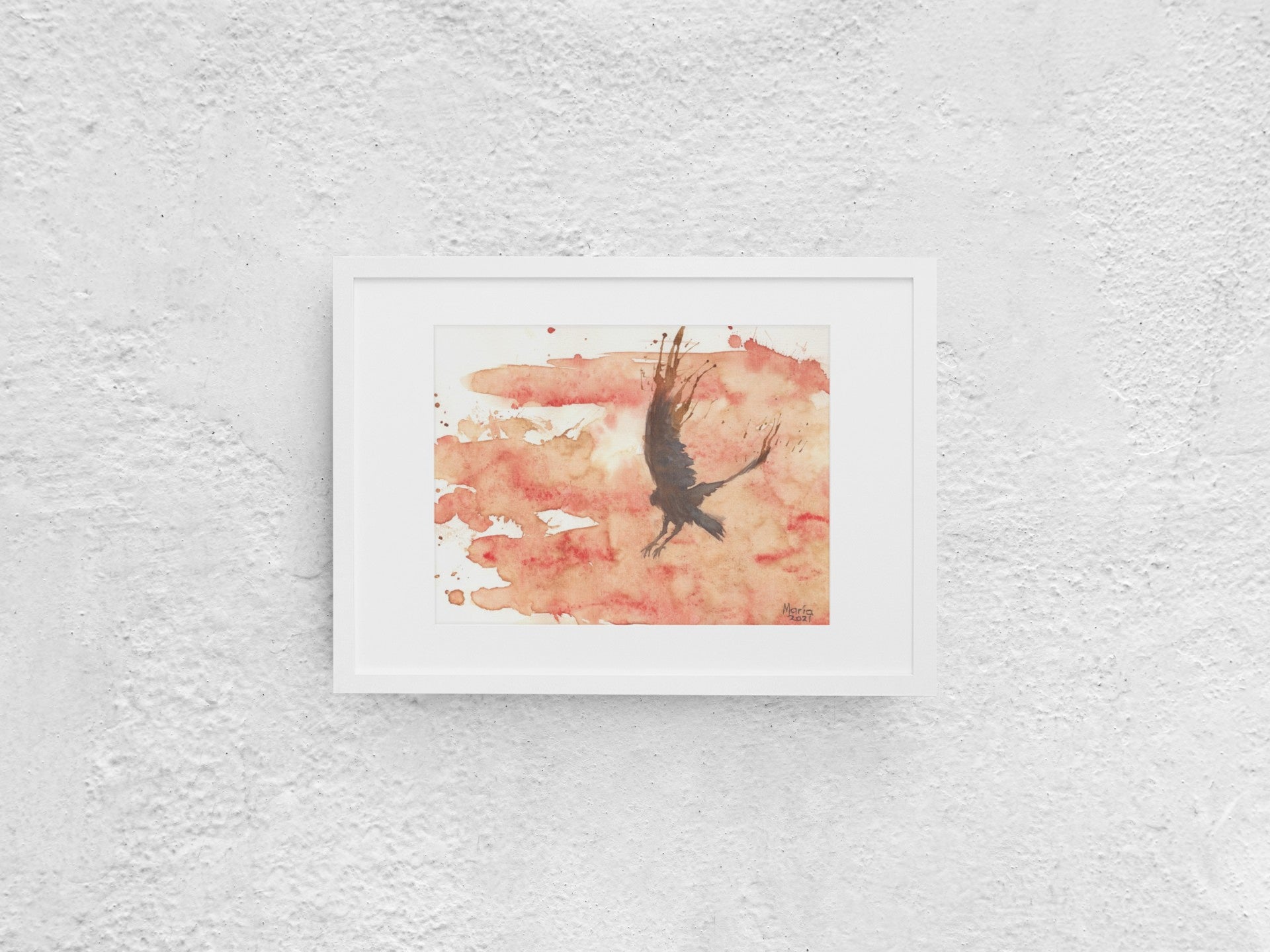 A watercolor and coffee painting of a black raven in mid-flight with its wings raised high and feet stretched, as if preparing to land. The background features a vibrant reddish-orange hue, resembling a hot summer day. The A4-sized artwork is displayed in a white mock-up frame against a neutral background, emphasizing the contrast between the dark raven and the vivid background.