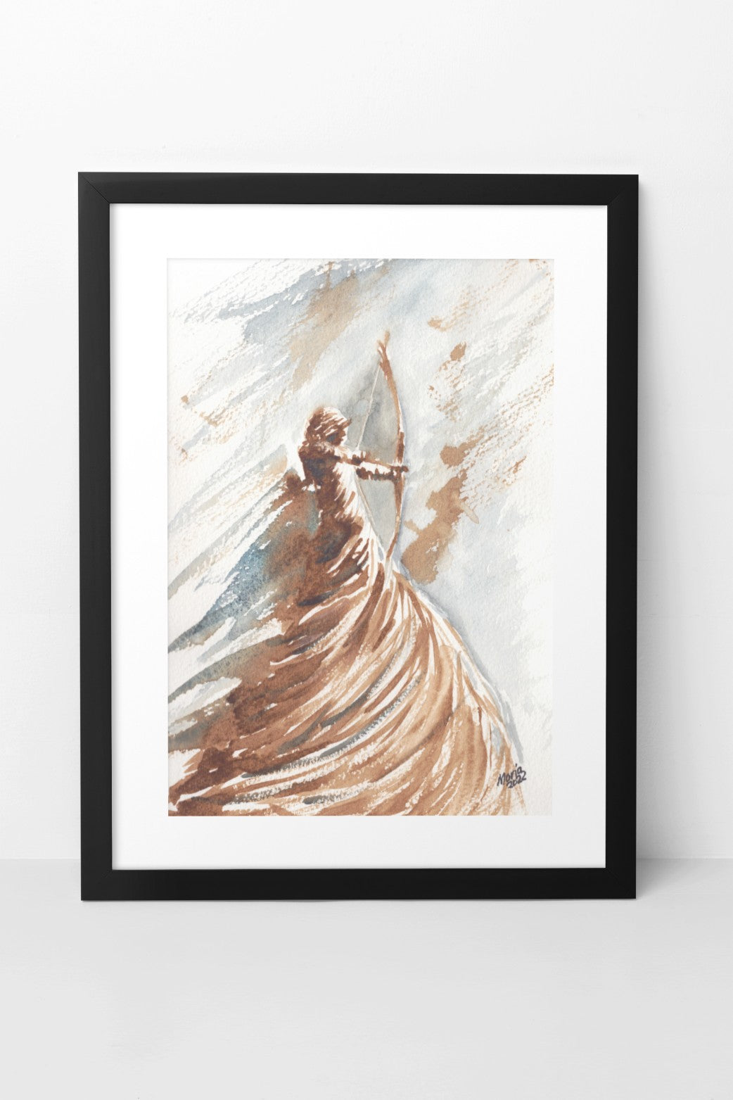 Earth-toned watercolor and coffee painting of a woman holding a bow and arrow, ready to shoot, as she looks to her right. She is painted in shades of brown, with light coming from the right, and wears a long, twisted dress that appears to rise from the earth beneath her. She stands high off the ground, giving an ethereal sense of elevation. The background features soft brown and blue hues. The A4-sized artwork is displayed in a black mock-up frame against a neutral background, emphasizing its earthy tones